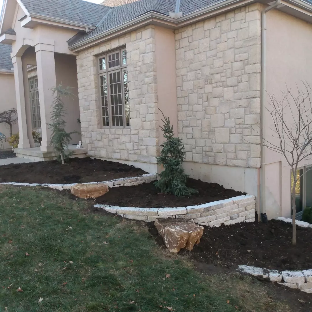 A closeup view of landscaping work on the outside of a home.
