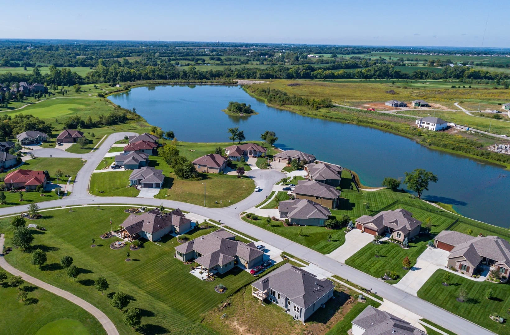 An aerial view of houses in The Communities at Falcon Lakes.