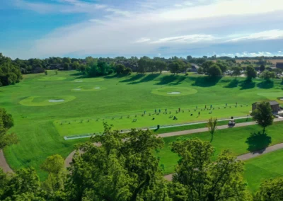 An aerial view of the driving range at Falcon Lakes Golf Club.