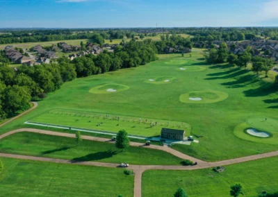 An aerial view of the driving range at Falcon Lakes Golf Club.
