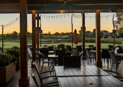 Photo of clubhouse outdoor seating at Falcon Lakes Golf Course.